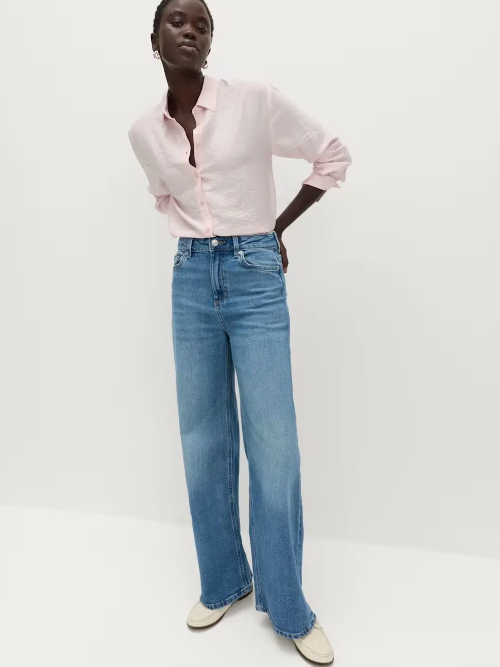 Woman in wide leg jeans