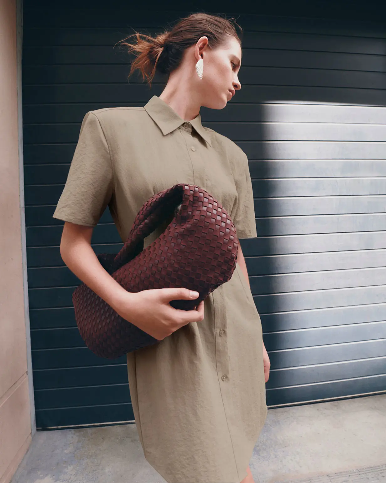 Woman wearing olive green dress