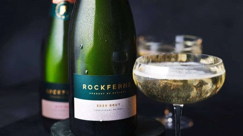 Bottle of Rockferne wine with glass of sparkling wine