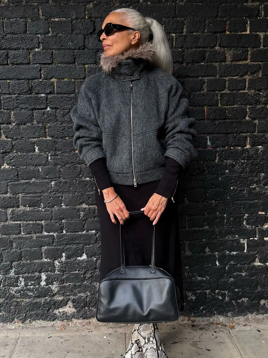 Mia Maugé in grey coat