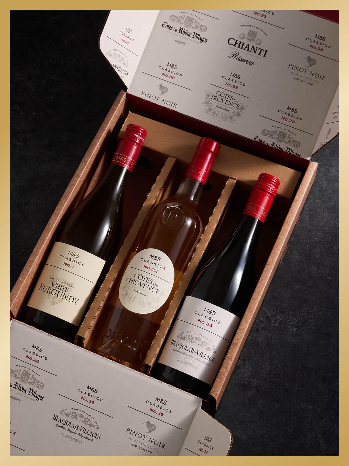 Three bottles of wine in box