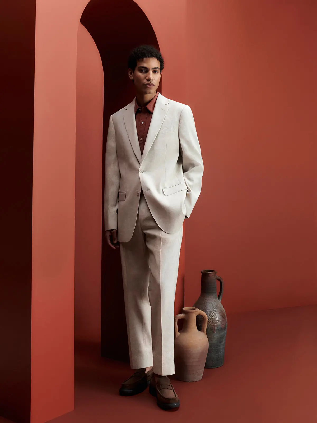 Man wearing white suit