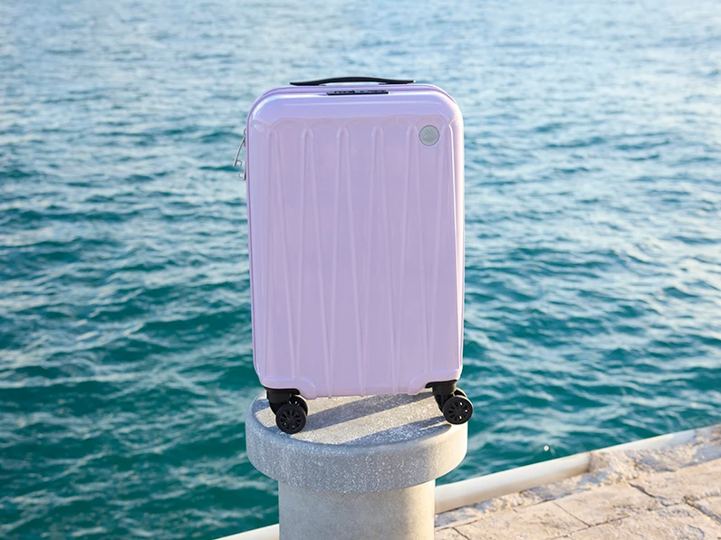 Lilac hard-shell carry-on suitcase