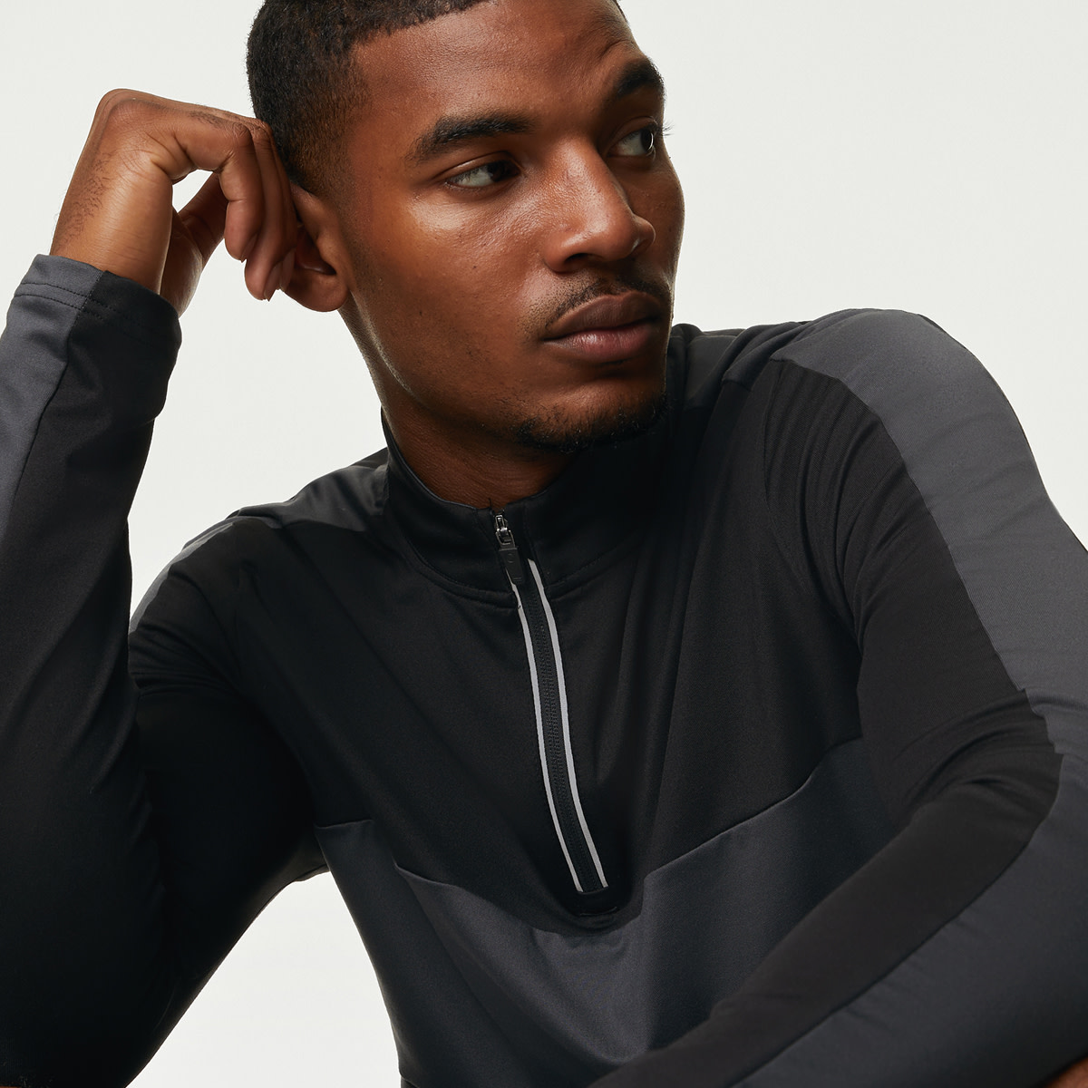 Man wearing black gym clothes