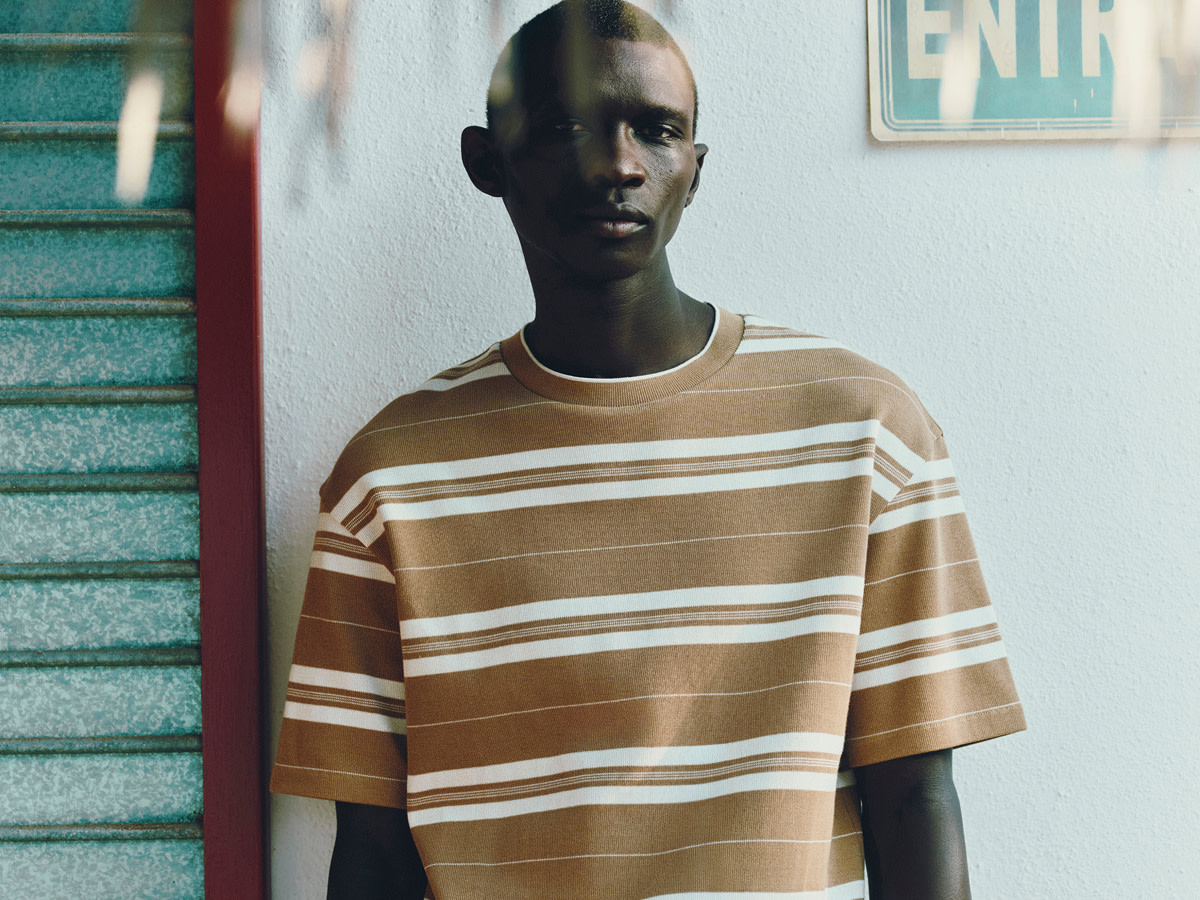 Man wearing striped t-shirt