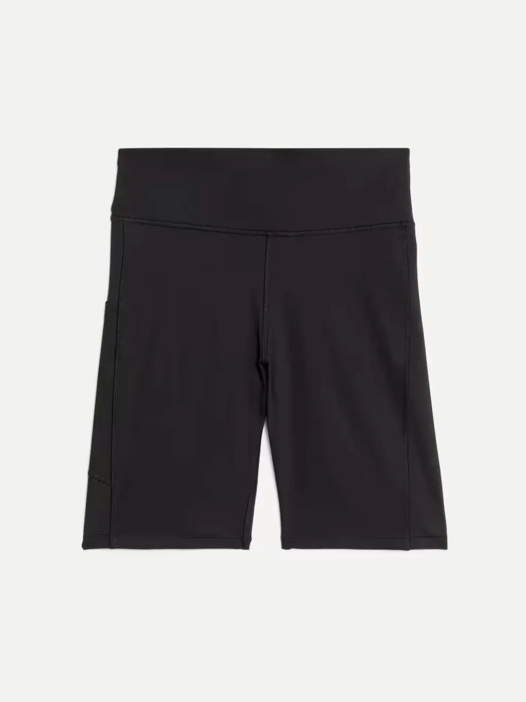 A cutout of plain black longer length running shorts