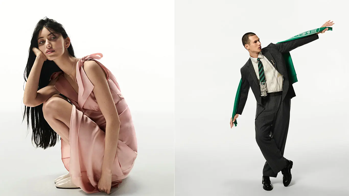 Woman wearing pink dress and man wearing black jacket and matching trousers