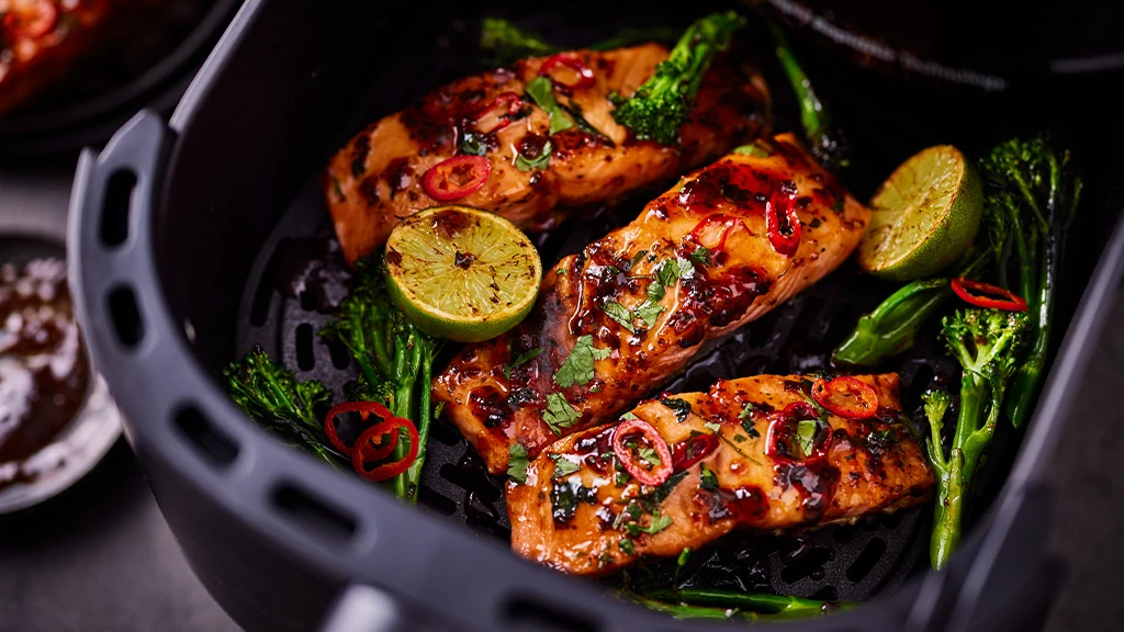 Salmon fillets in air fryer drawer