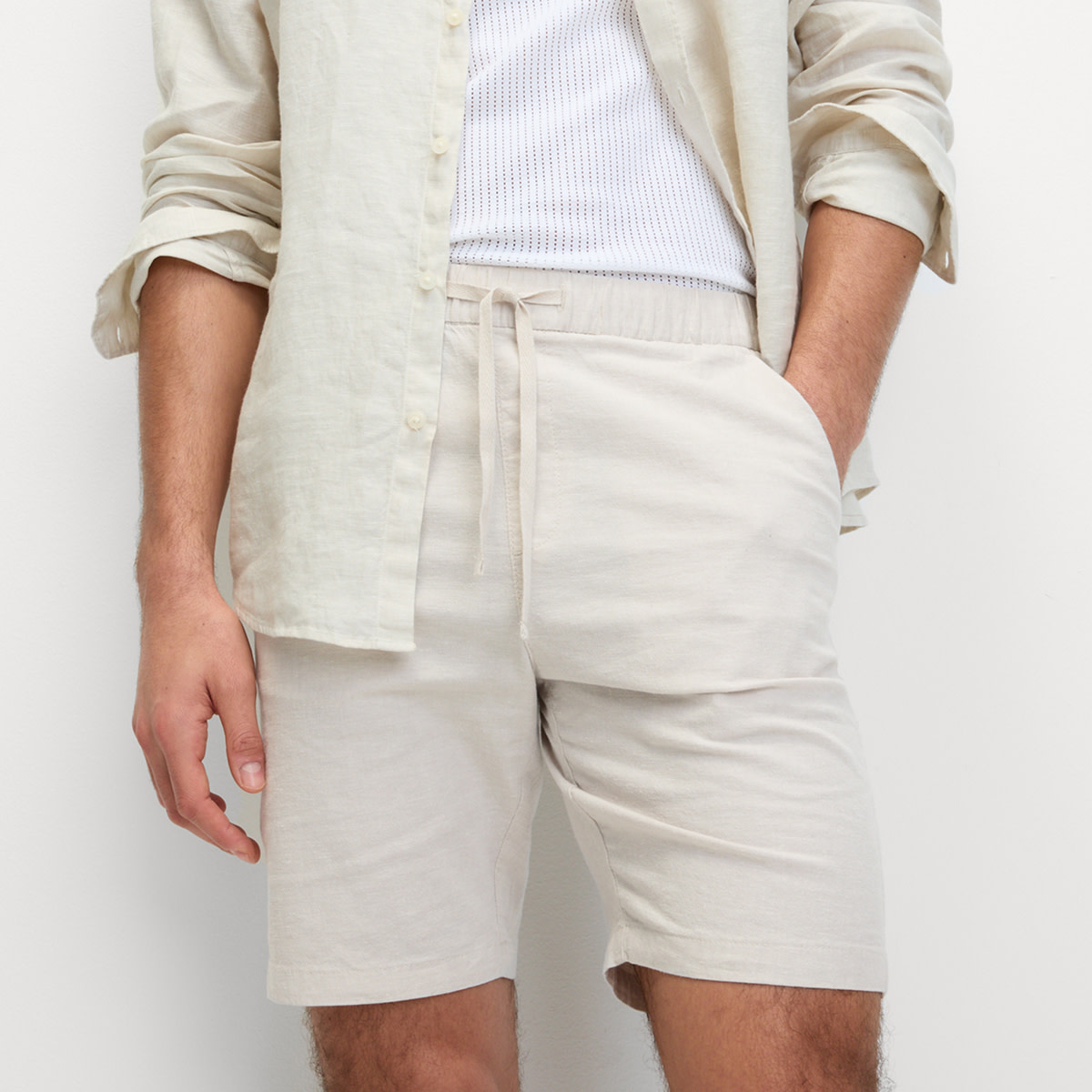 Man wearing white shorts