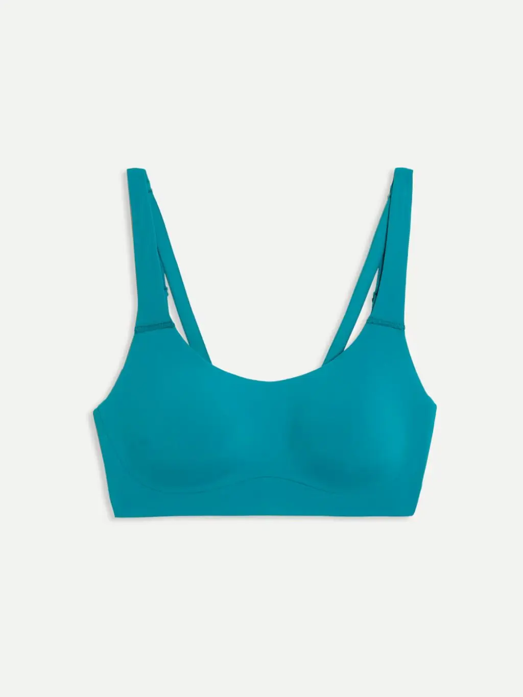 A cutout of a blue medium-impact sports bra