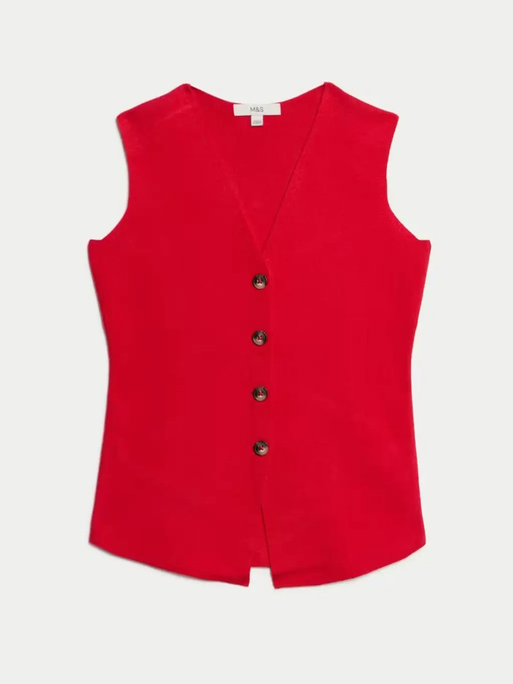 A cutout of a red knitted waistcoat