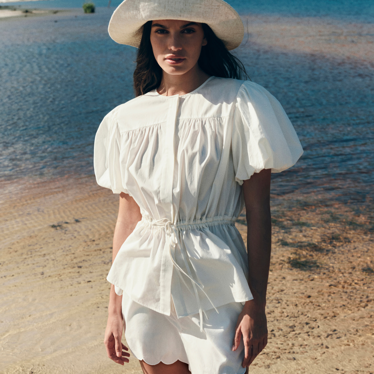 Woman in all white outfit