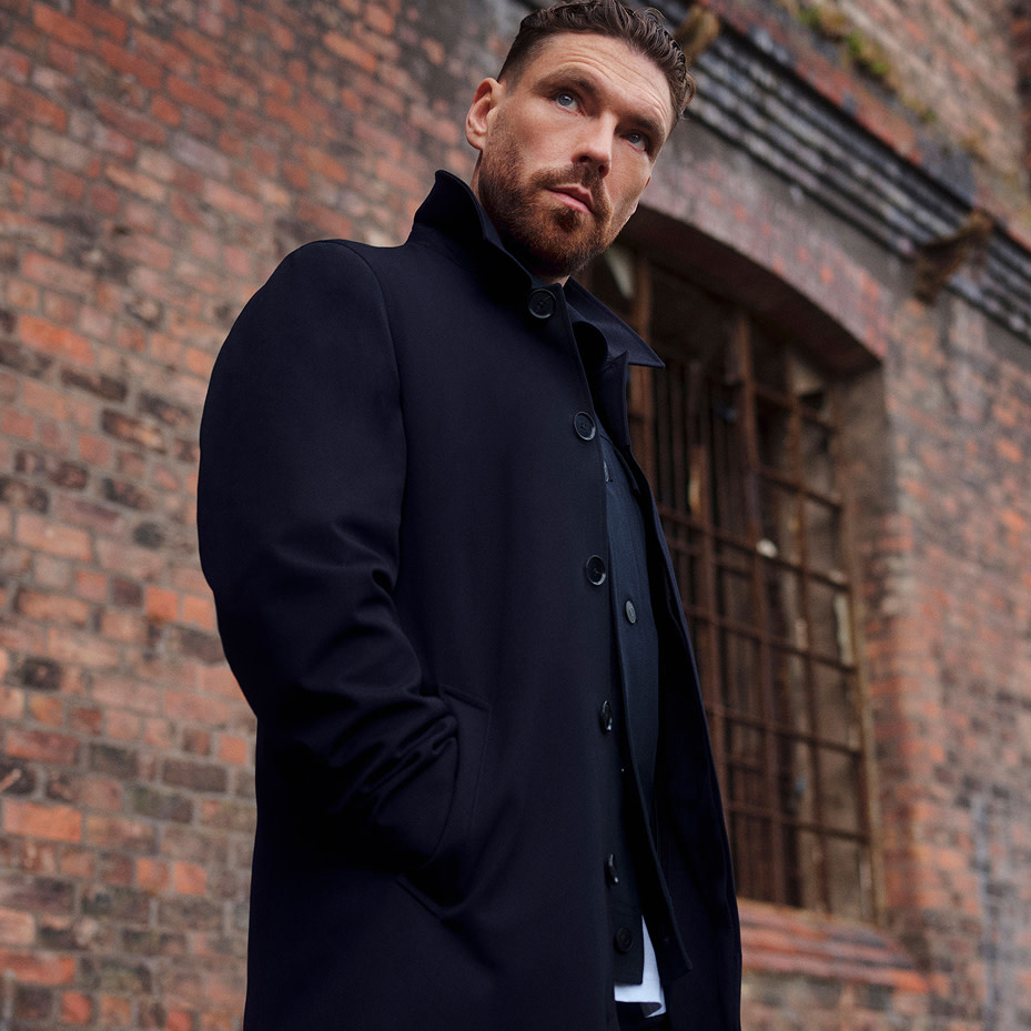 Man wearing black coat