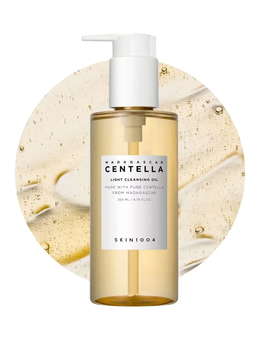 A bottle of Centella oil cleanser in front of a blob of oil