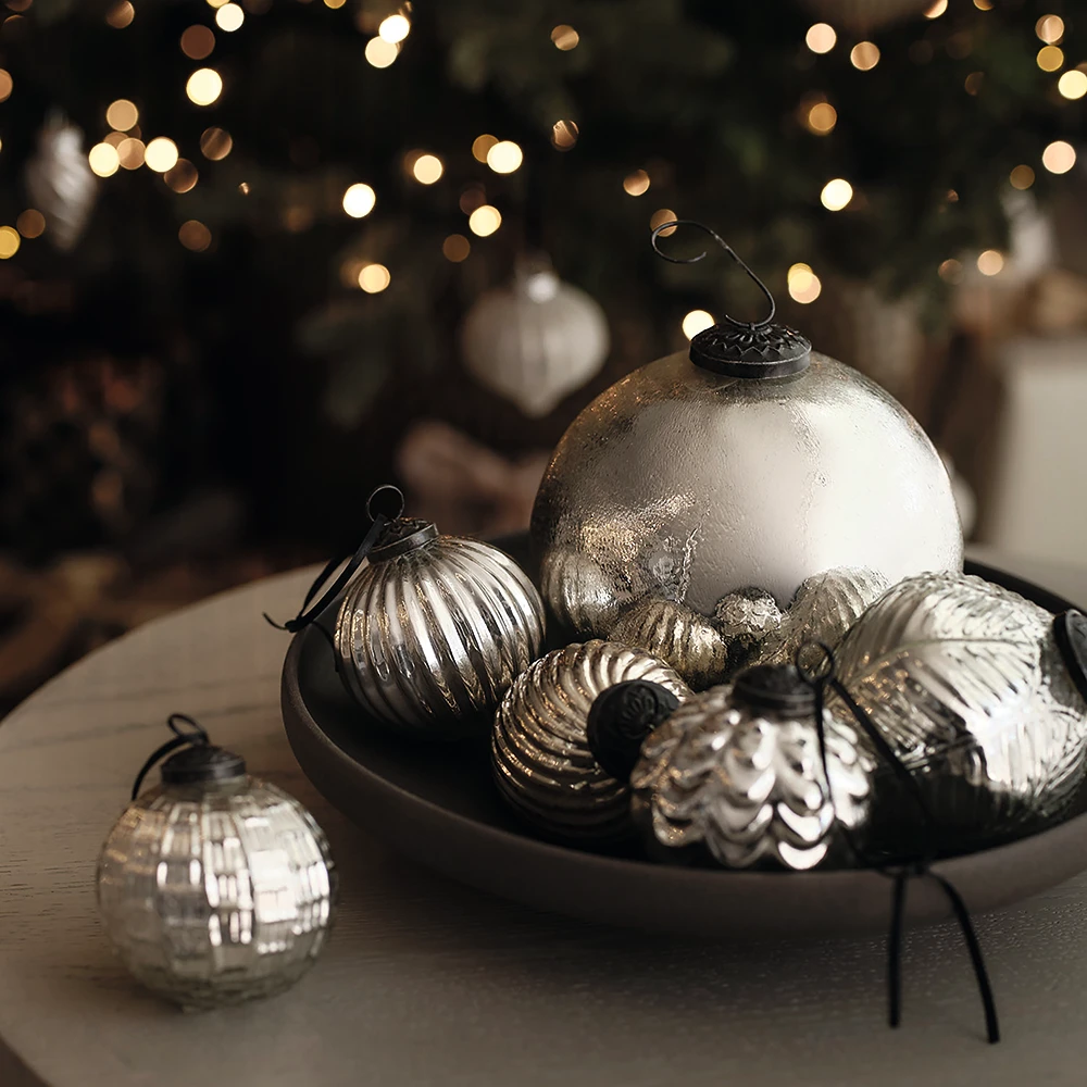 Assorted silver baubles from the Christmas M&S x Kelly Hoppen collection