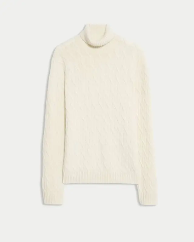 A cutout of a cream cashmere men's roll neck