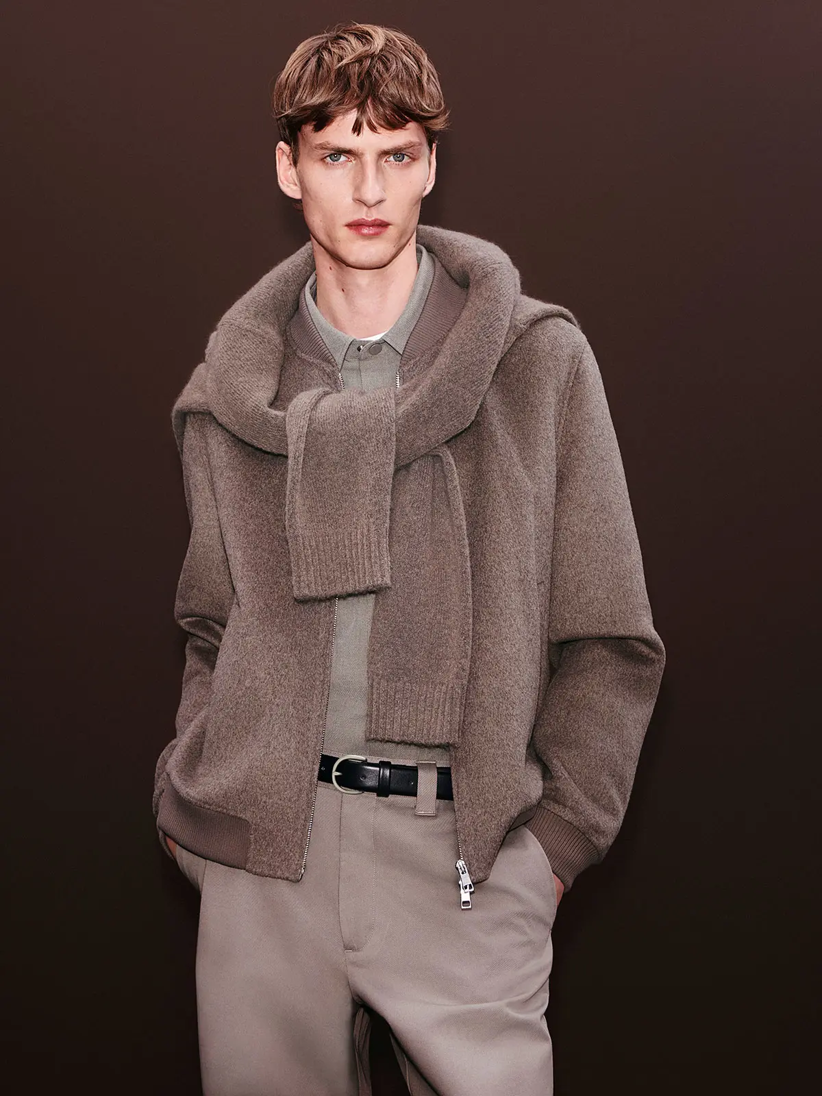 Man wearing brown outfit