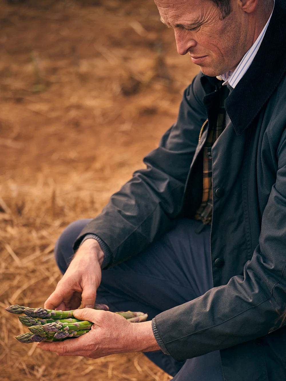 Chris Chinn holding asparagus