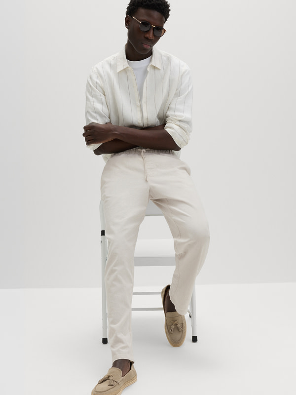 Man wearing Loose Fit Linen Blend Trousers