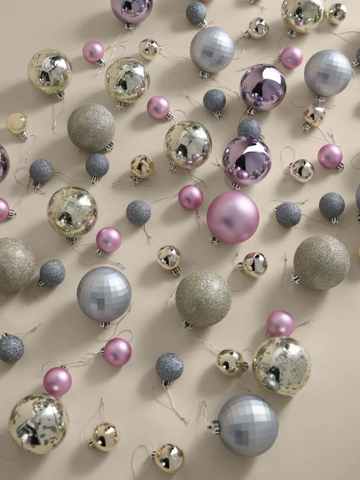 Image of an assortment of pink, silver and gold baubles