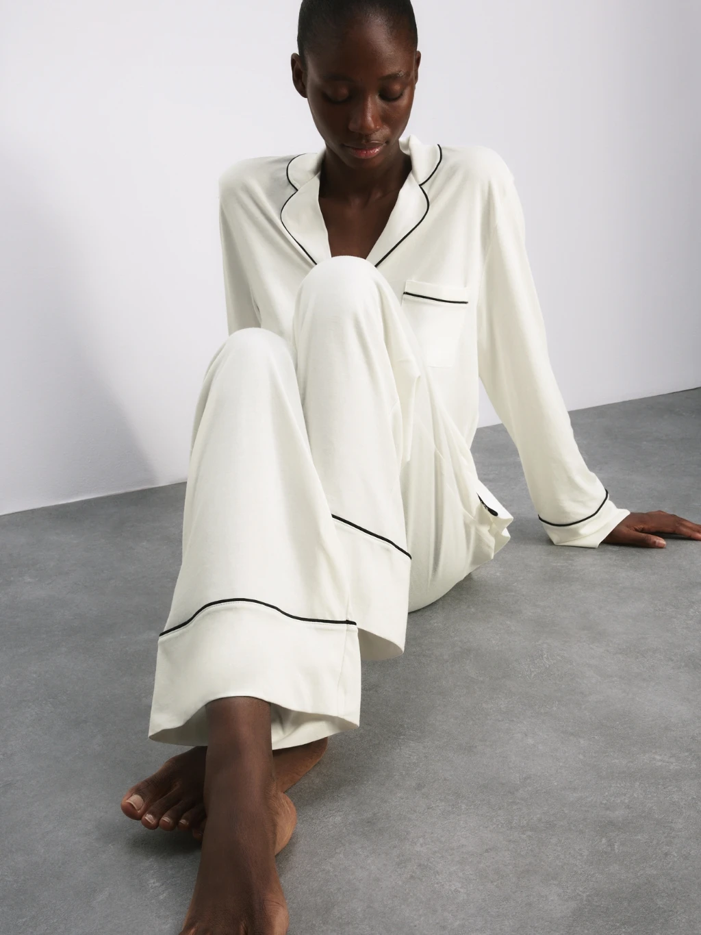 Woman wearing cream pyjama set