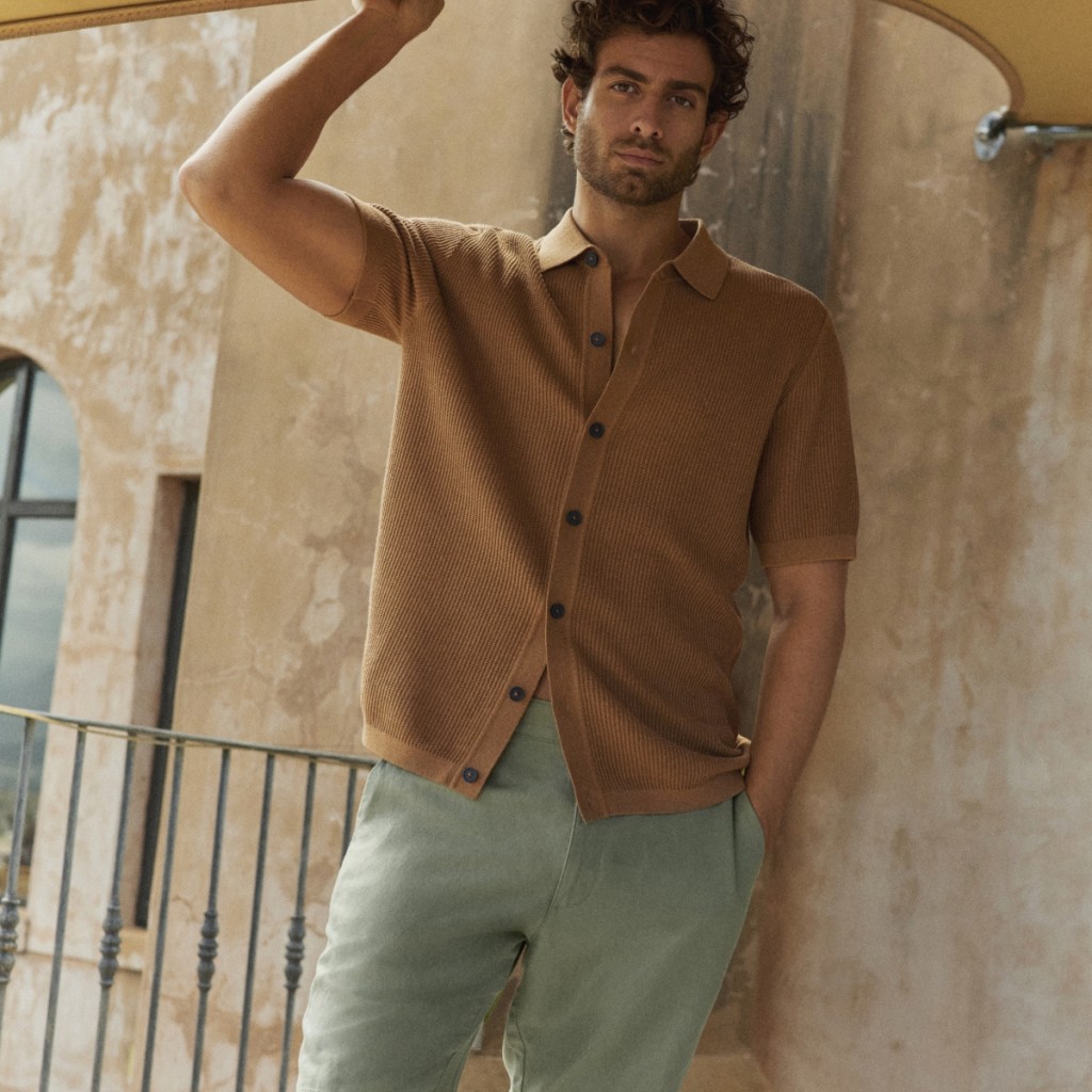 Man wearing a brown linen shirt and sky blue shorts . Shop now 