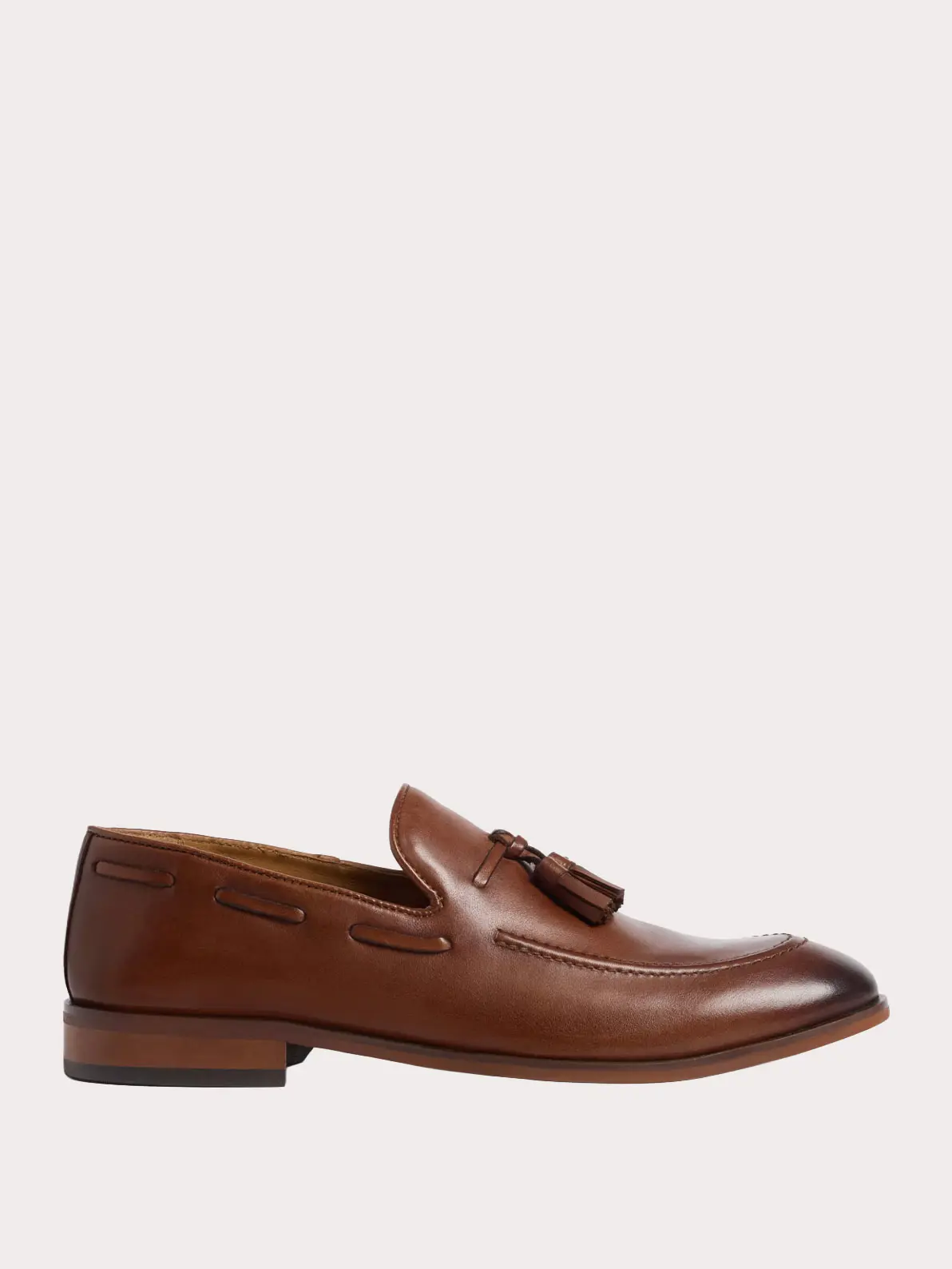 Leather brown loafer with tassel detail