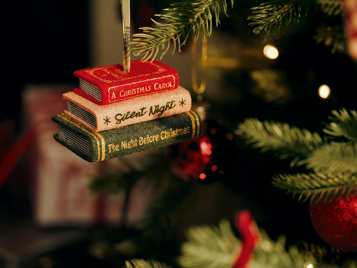 Close up of Christmas bauble shaped like a book