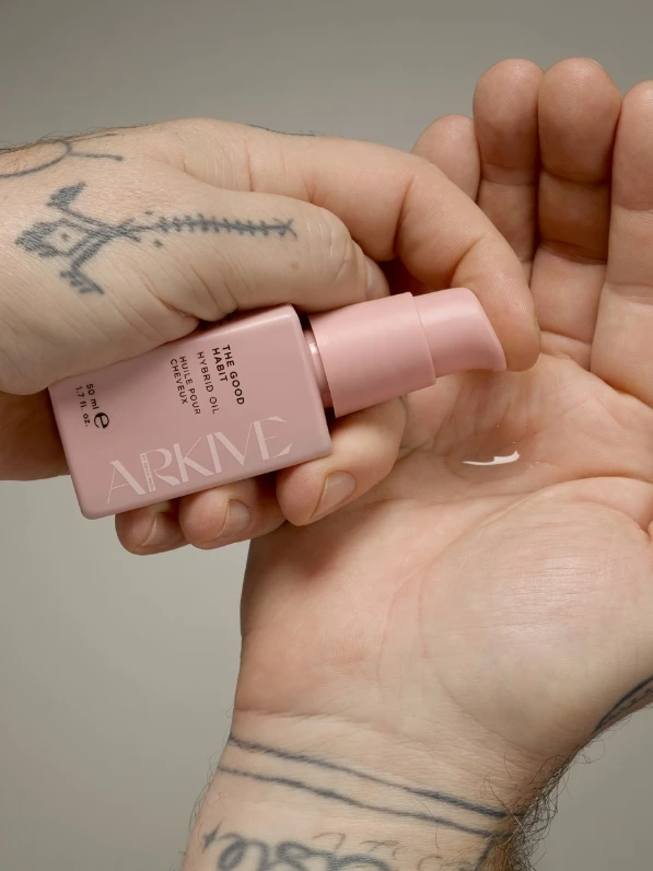 Person using hair serum