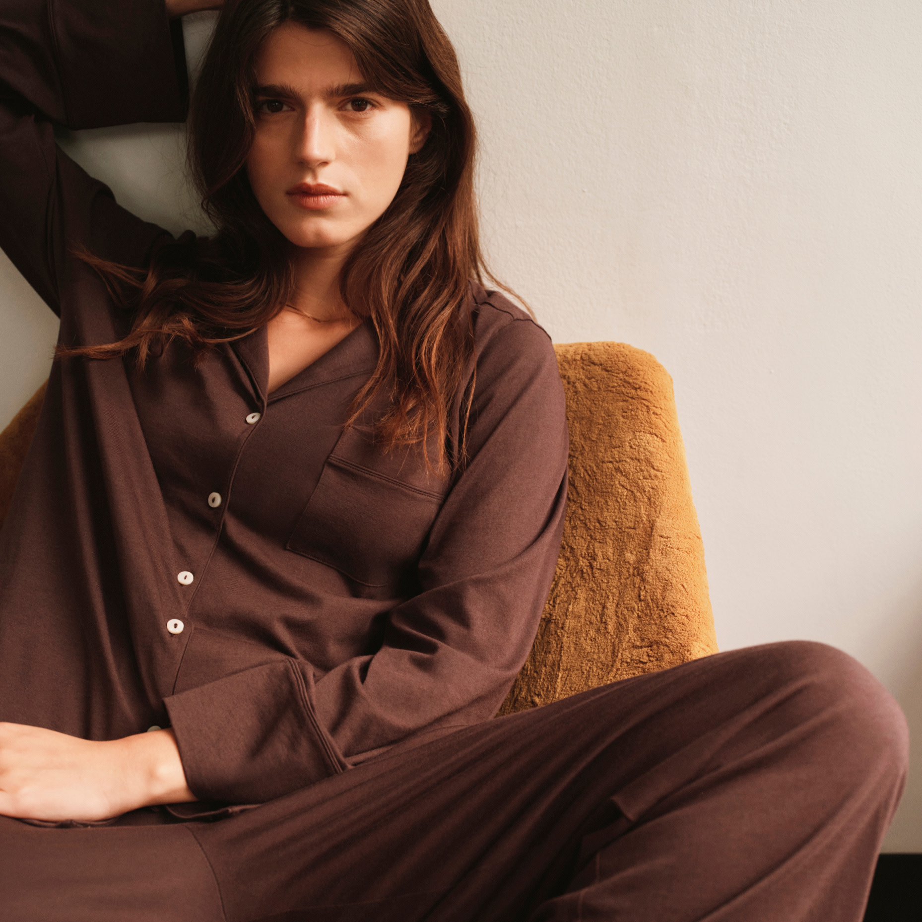 Woman in brown pyjamas