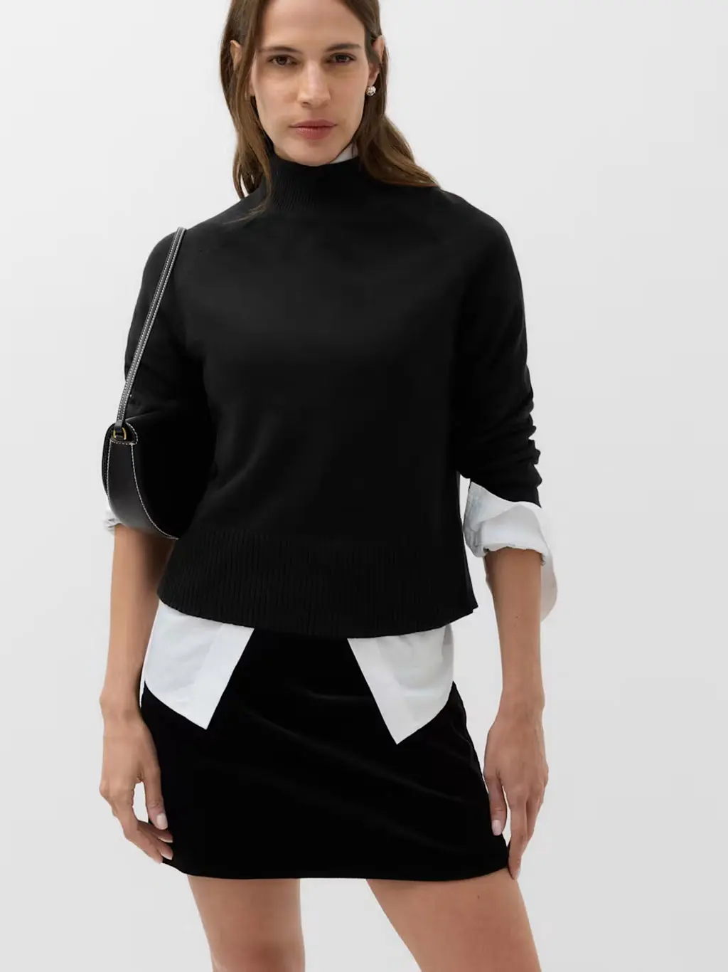Woman in mini skirt and jumper
