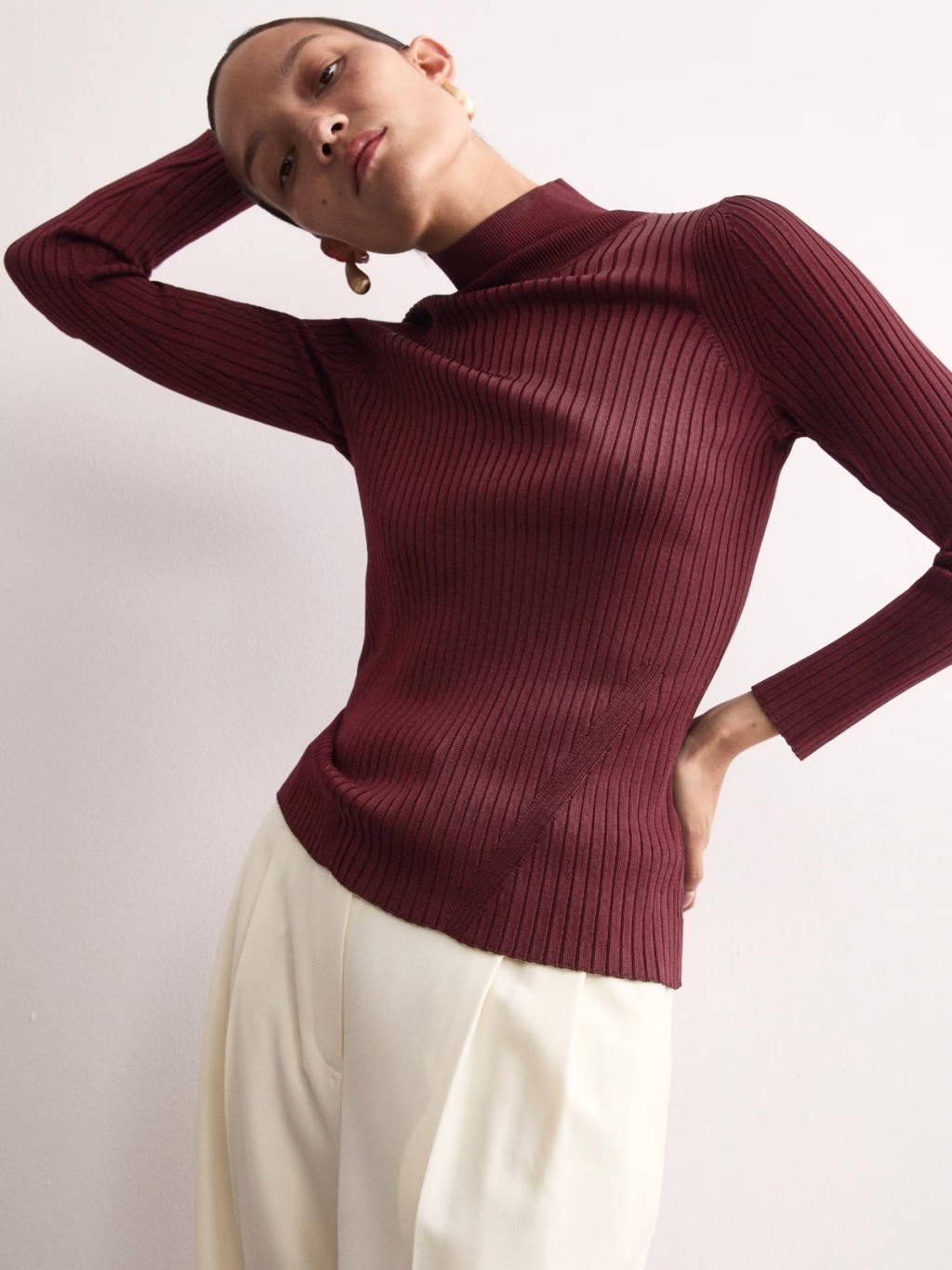 Women wearing Burgundy tops. shop now