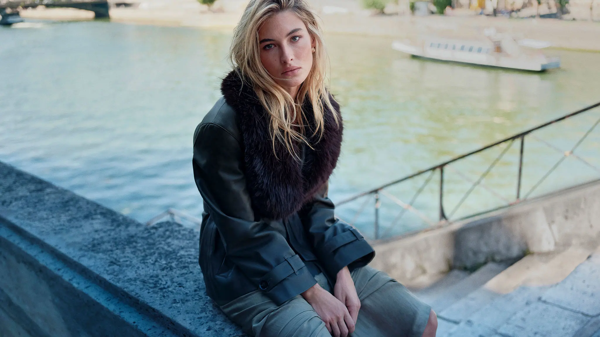 Woman in faux leather jacket