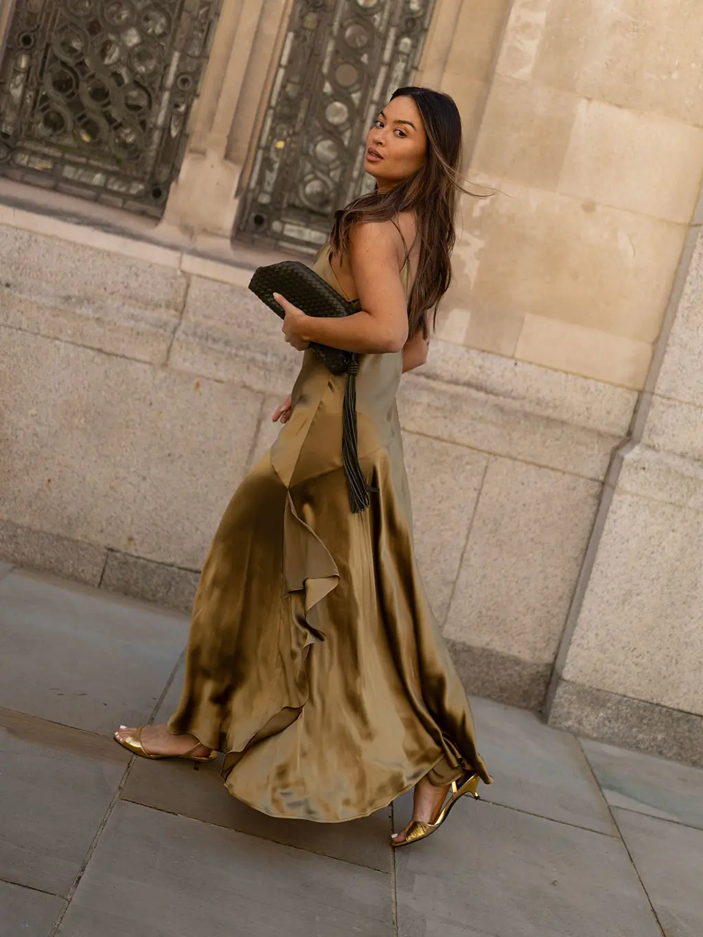 Woman in olive green dress