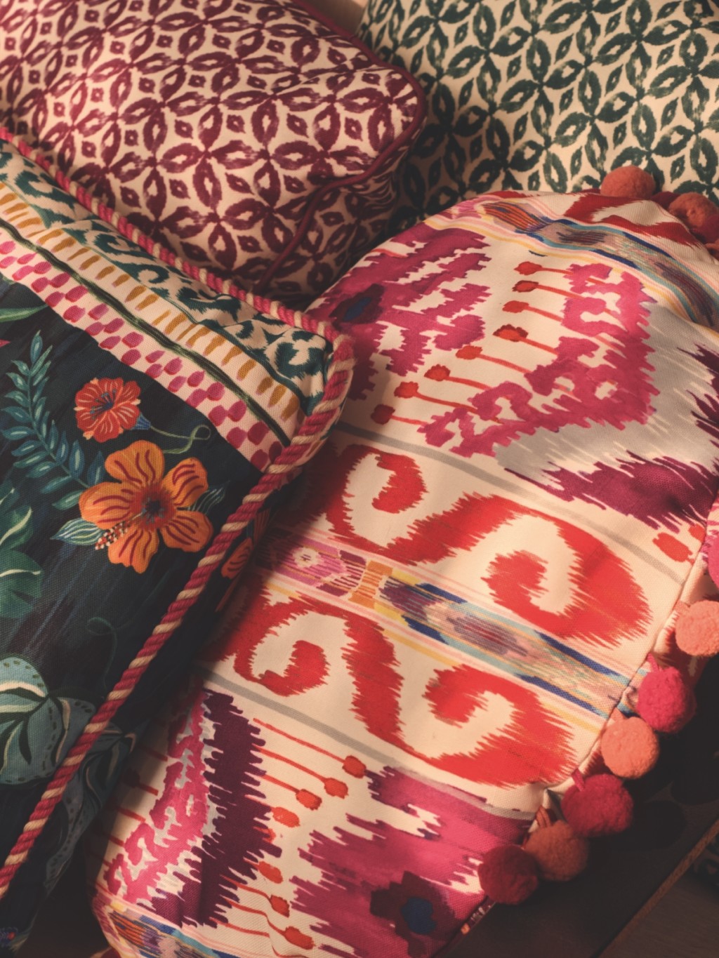 Selection of brightly-patterned cushions. Shop cushions