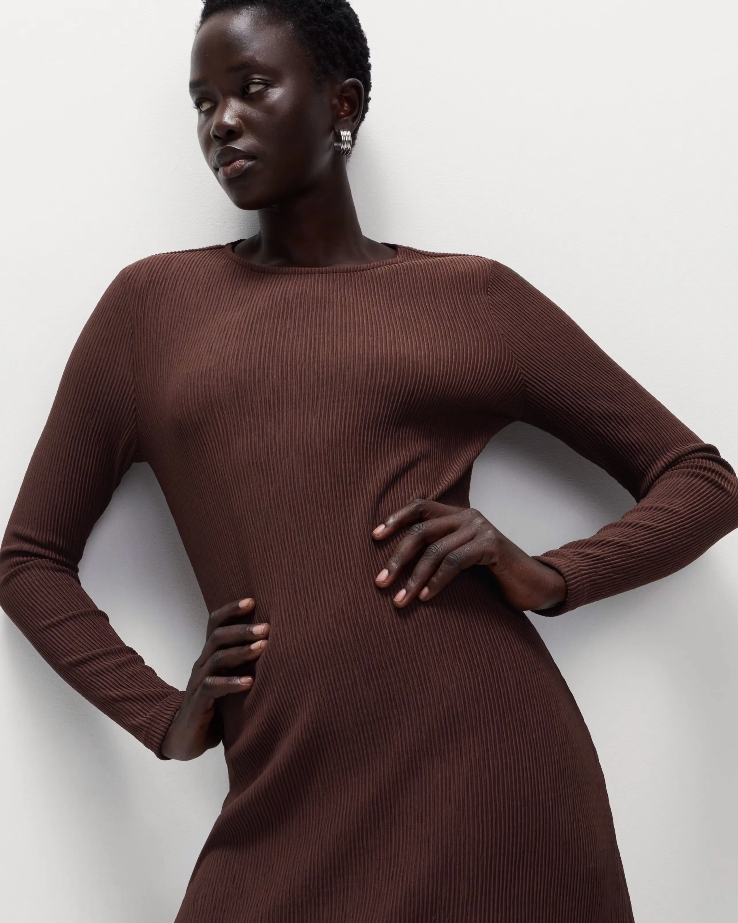 Woman wearing chocolate brown dress