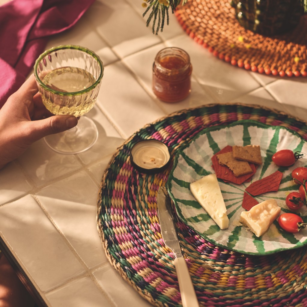 Brightly coloured placemat and plate. Shop tableware

