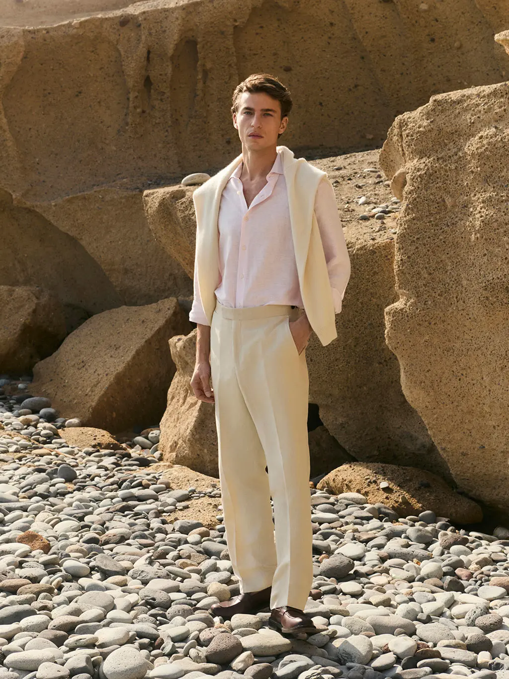 Man in linen suit on beach