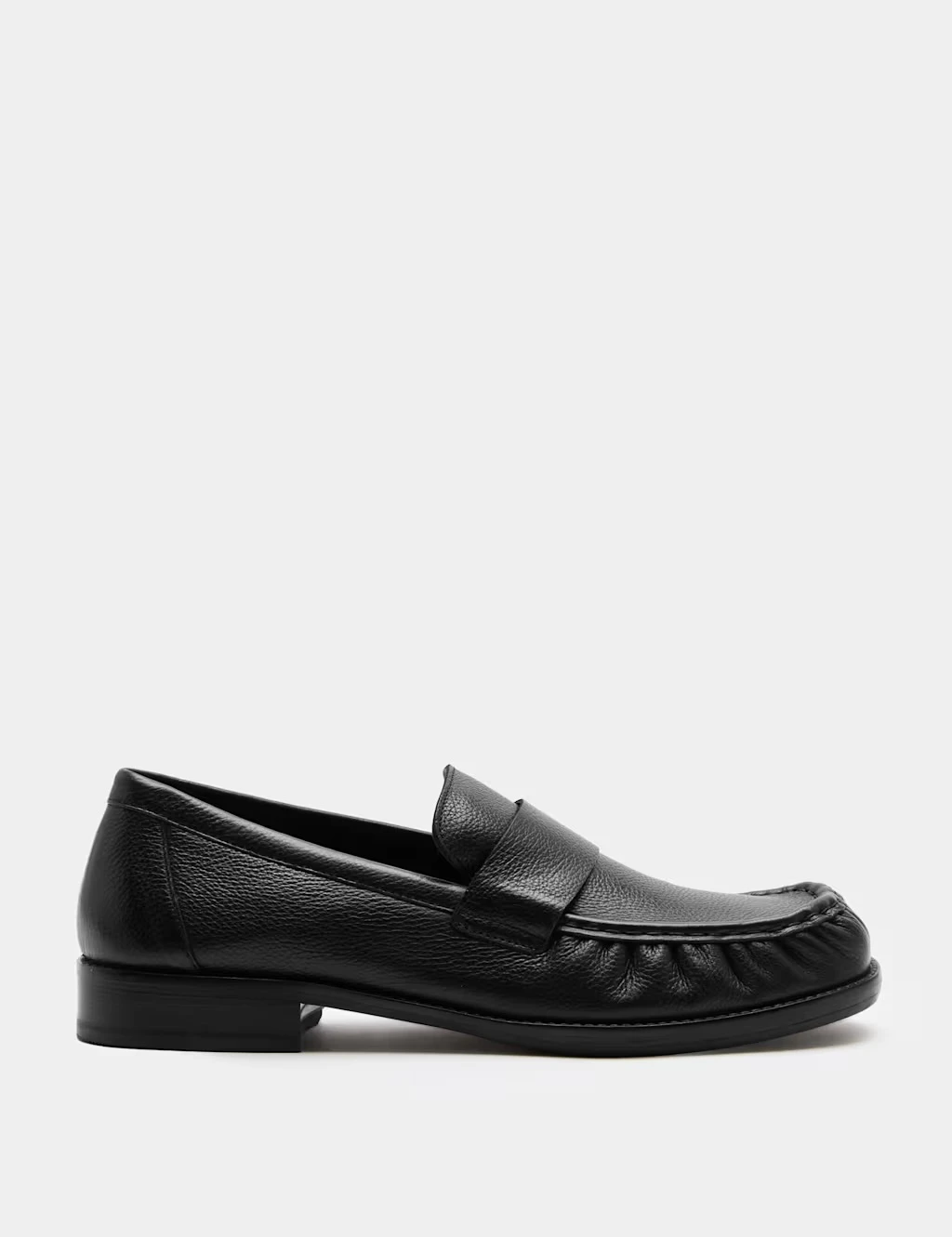 Men's black leather loafers.