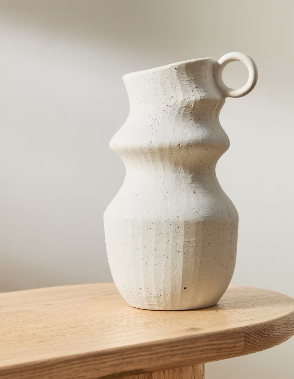 Asymmetric curved cream vase by M&S