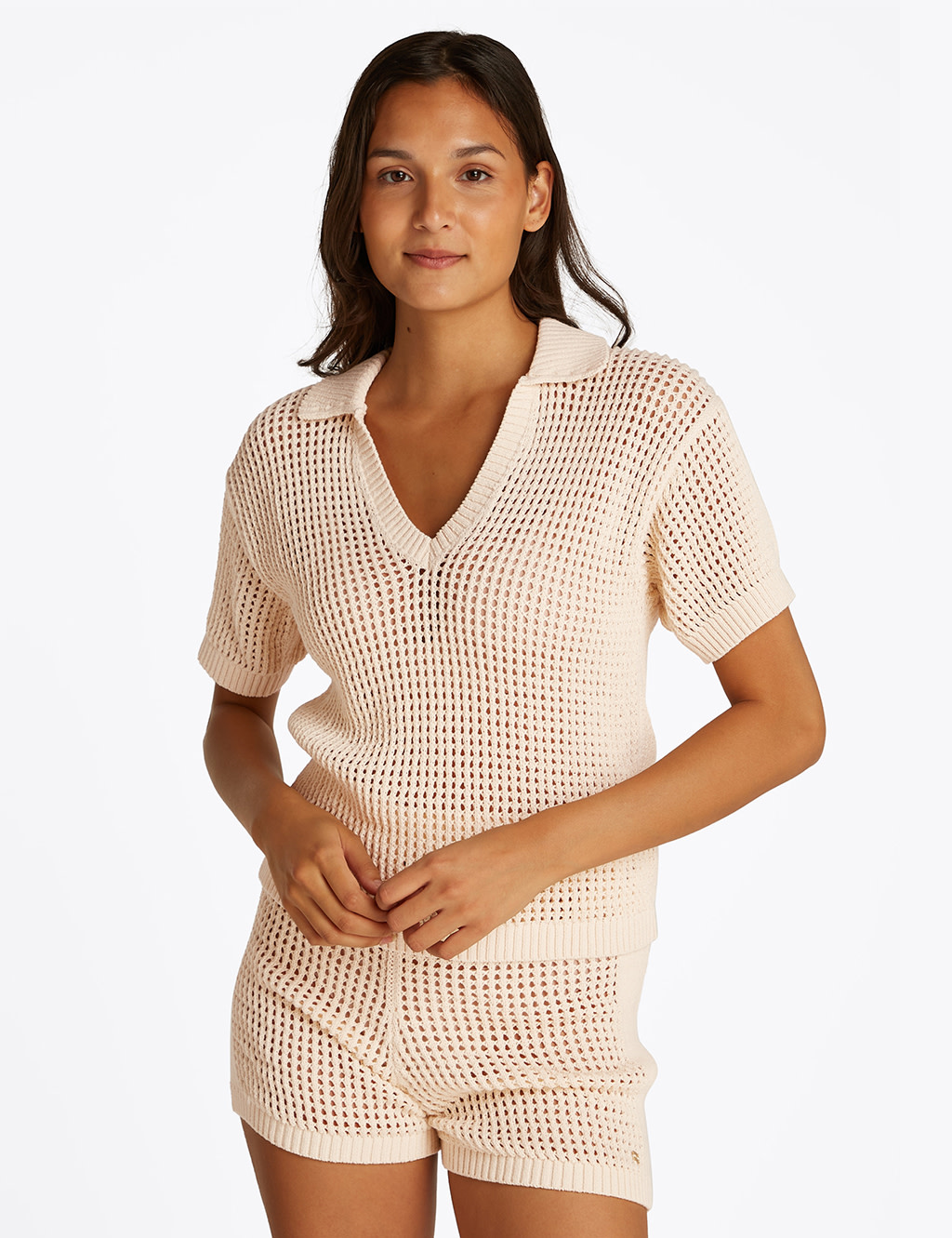 Women wearing crochet beach cover up shirt