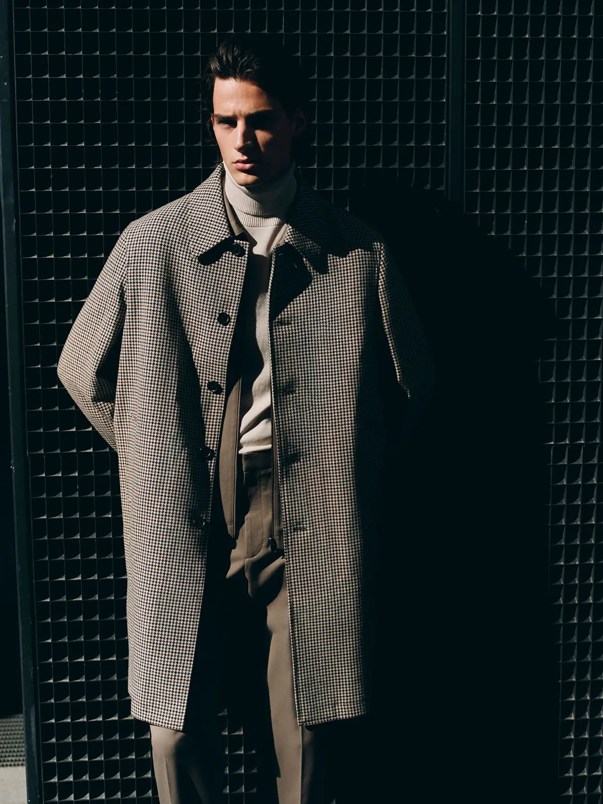 Man wearing houndstooth coat