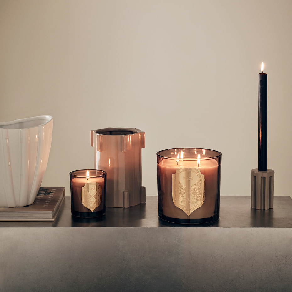 Candles and bowls on table