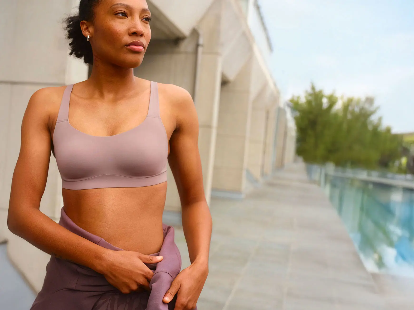Woman wearing lilac sports bra at M&S