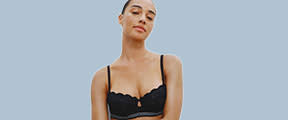 Woman wearing black bra