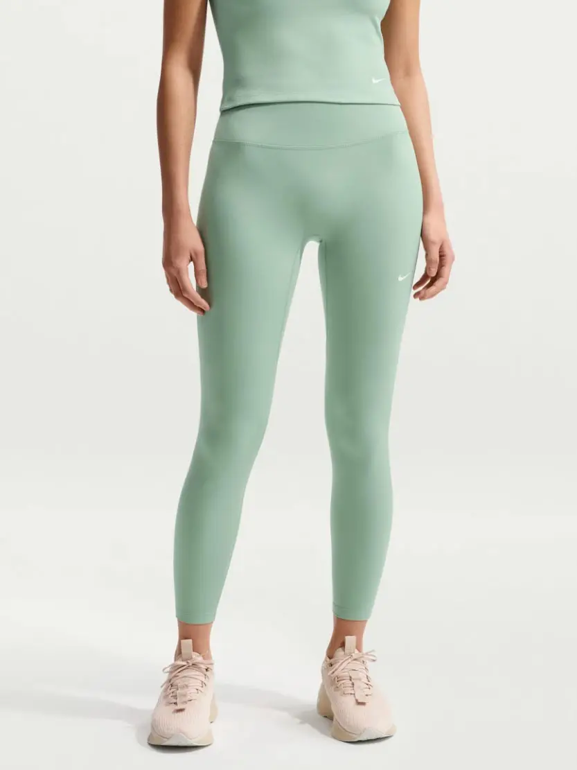 Woman wearing mint green leggings 