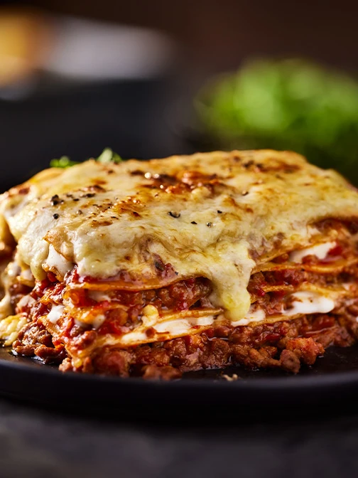 Lasagne on black plate