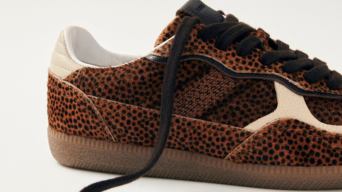 A pair of leopard print trainers