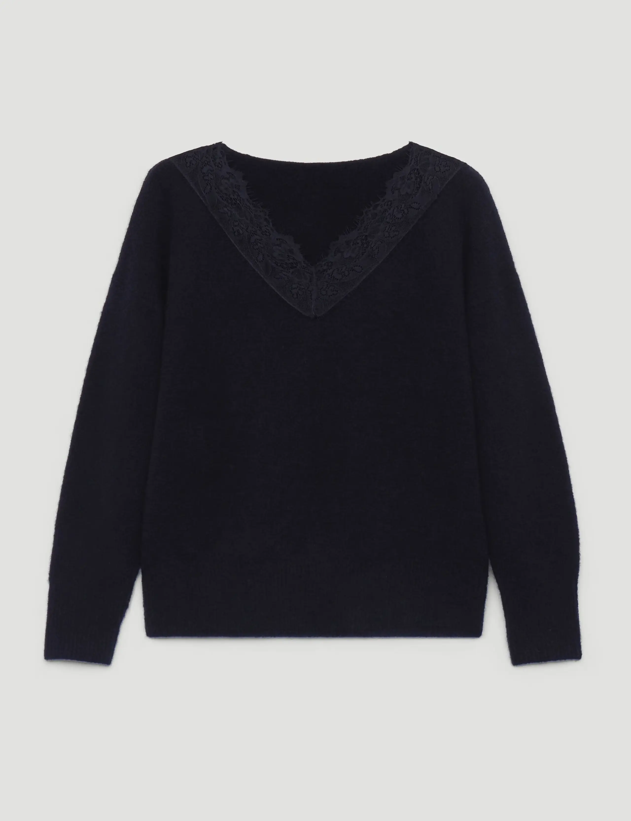 Black V-neck jumper with a lace trim.