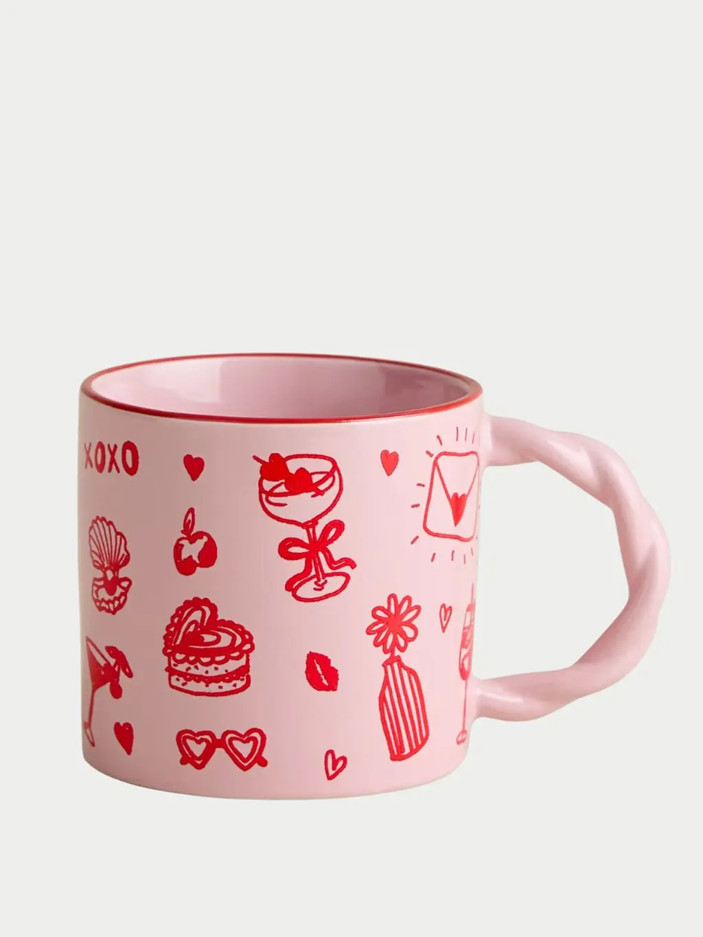 A pink and red Valentine's Day mug